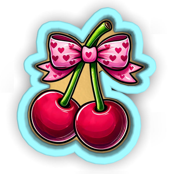 a sticker of two cherries with a bow