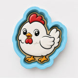 A cartoon image of a white chicken with a red comb and feet, depicted in a blue cookie cutter shape.