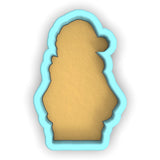 a cookie cutter with a cookie shaped like a teddy bear