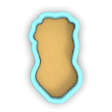 a cookie cutter with a cookie in the shape of a cookie