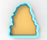 A blue-bordered cookie cutter in the shape of a cake or dessert.