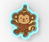 a cartoon monkey with a party hat on