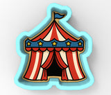 a red, white and blue circus tent with stars on it