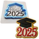 a cookie with a graduation cap on top of it