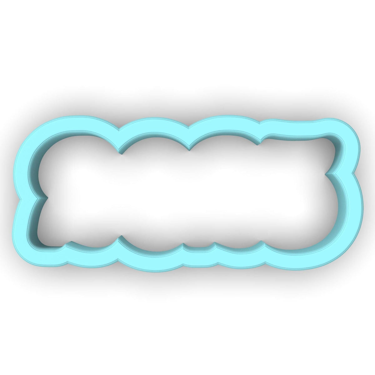 a cookie cutter shaped like a cloud on a white background