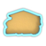 a paper cut out of the shape of a house