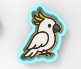 A white parrot with yellow crest and wings is depicted in the image.