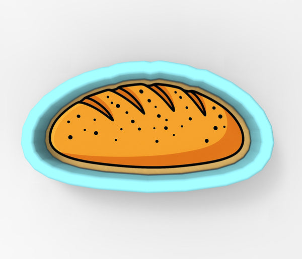 A loaf of bread with a textured surface and a light blue rim, placed in a blue bowl.