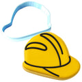a cookie shaped like a hard hat and a cookie cutter