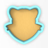 a cookie cutter shaped like a teddy bear