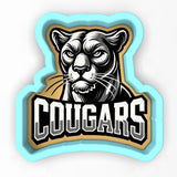 a sticker of a cougas logo on a white background