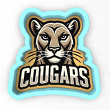 a sticker of a cougars logo on a white background