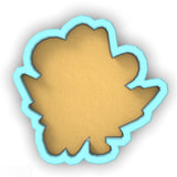 a cookie cutter with a cookie in the shape of a flower