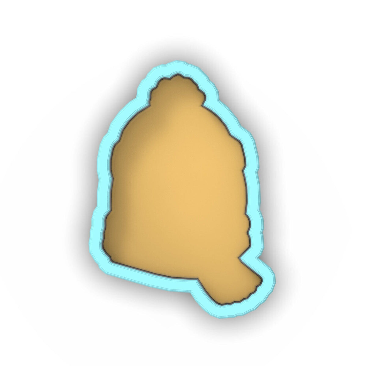 a cookie cutter with a cookie in the shape of a head