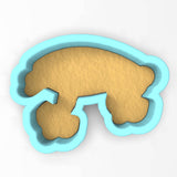 a cookie cutter shaped like a cat's tail