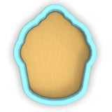 a cookie cutter with a cookie inside of it