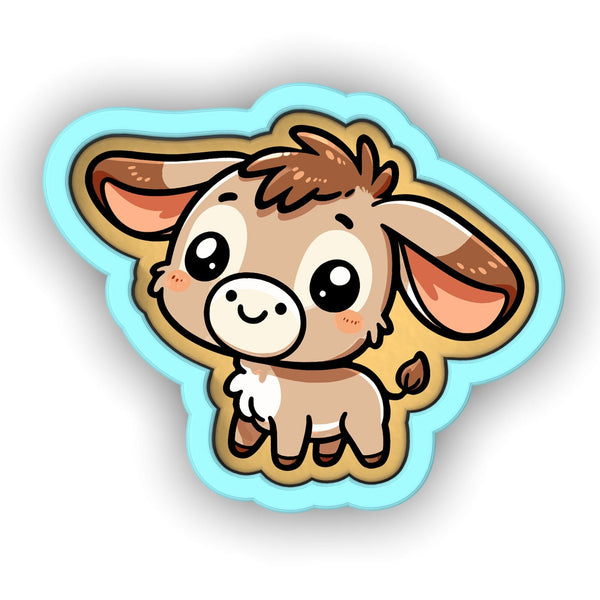 a sticker of a little cow with big eyes