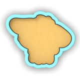 a cookie shaped like a bear on a white background