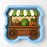 A blue and green toy wagon with a wooden frame, displaying various vegetables such as carrots, lettuce, and potatoes.