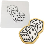 a cookie with a pair of dice on it