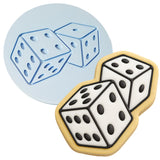a cookie with a pair of dice on top of it