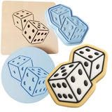 a cookie with a dice and a pair of dices on it