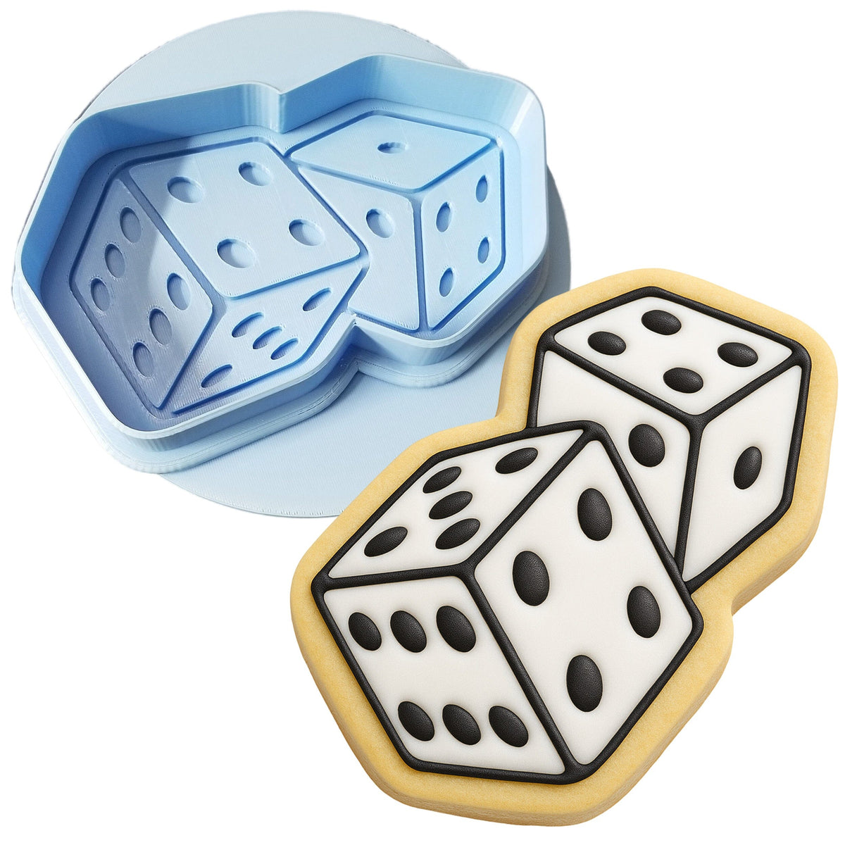 a cookie shaped like a dice and a cookie shaped like a dice