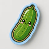 A green pickle with a smiling face and eyes is depicted in the image.