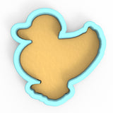 a cookie cutter shaped like a bird on a white background
