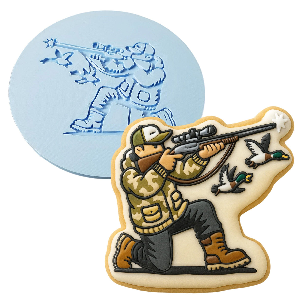 a cookie with a picture of a man shooting a bird