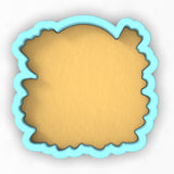 a paper cut out of the shape of a scallop