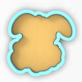 a cookie shaped cookie cutter with a cookie in the shape of a cloud