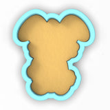a cookie shaped like a teddy bear on a white background