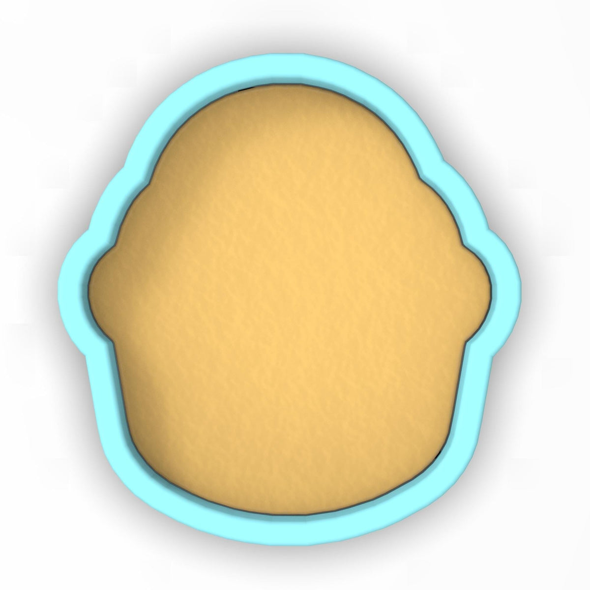 a cookie cutter with a cookie inside of it