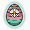 an egg with a flower painted on it