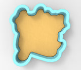 A 3D rendering of a blue-bordered cookie cutter in the shape of a yellow object, likely representing a cookie or dough.