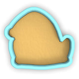 a cookie cutter with a cookie shaped like a hand