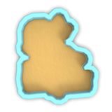 a cut out of a piece of paper with a blue border