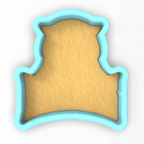a cookie cutter with a piece of bread in the shape of a crown