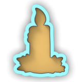 a lit candle with a shadow on a white background