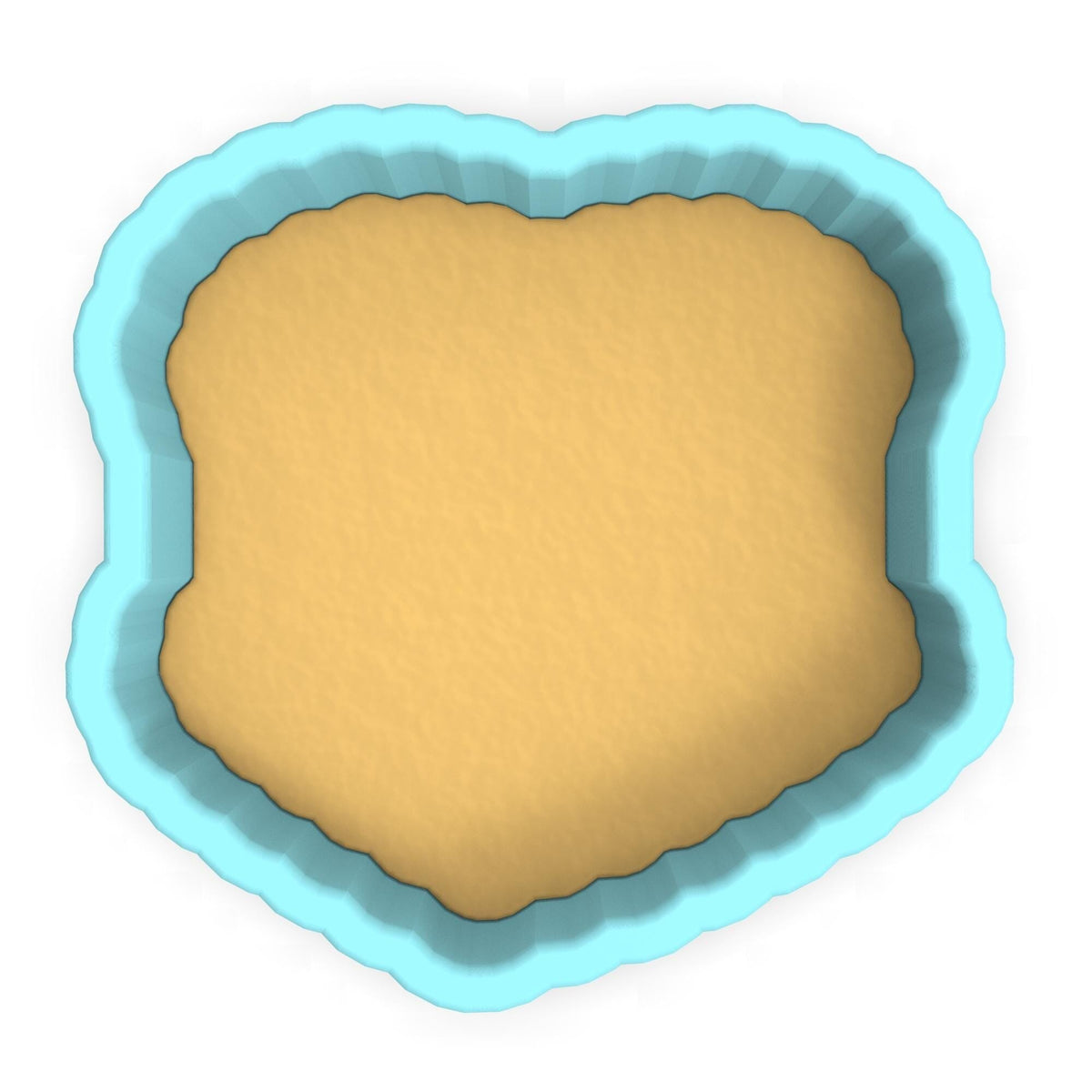 a cookie cutter with a cookie in the shape of a heart