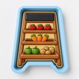 A blue tray with three shelves, each containing various vegetables such as carrots, peppers, and potatoes.
