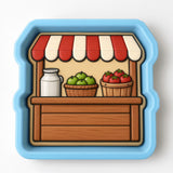 A blue and white toy store display with various items, including a milk jug, baskets of fruit, and a wooden shelf.