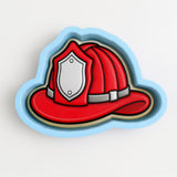 A red fire helmet with a silver emblem is depicted in the image.