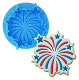 a cookie cutter and a cookie shaped like a star