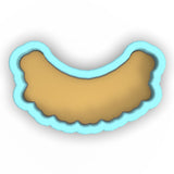 a cookie cutter with a cookie shaped like a cookie