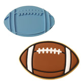 a cookie shaped like a football and a cookie cutter