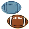 a cookie shaped like a football and a cookie cutter