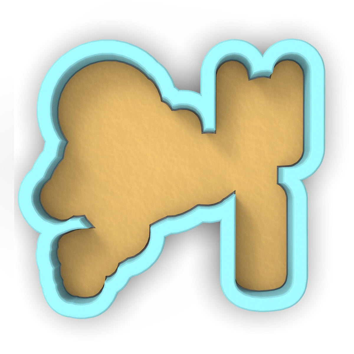 a cookie shaped like the letter k