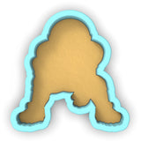 a cookie shaped like a teddy bear